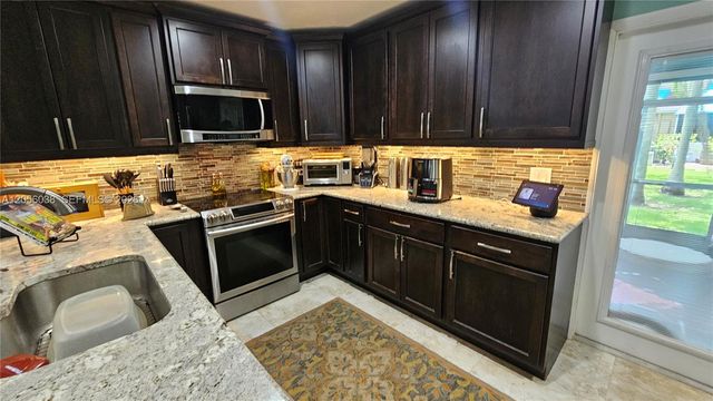 7252 Woodmont Avenue, Tamarac, FL 33321