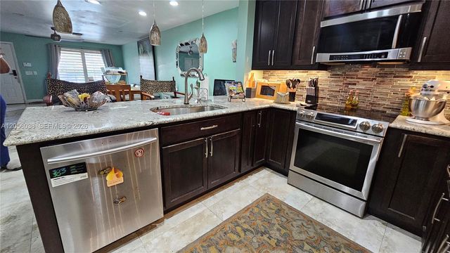 7252 Woodmont Avenue, Tamarac, FL 33321