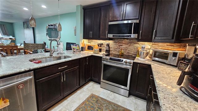 7252 Woodmont Avenue, Tamarac, FL 33321