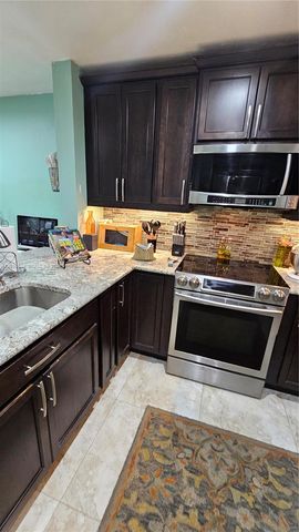 7252 Woodmont Avenue, Tamarac, FL 33321
