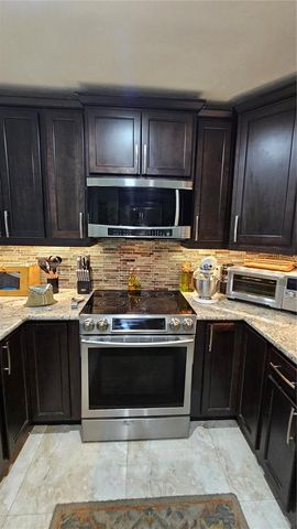 7252 Woodmont Avenue, Tamarac, FL 33321