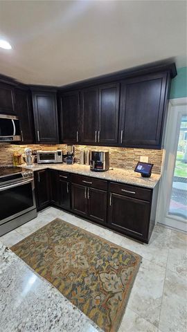 7252 Woodmont Avenue, Tamarac, FL 33321