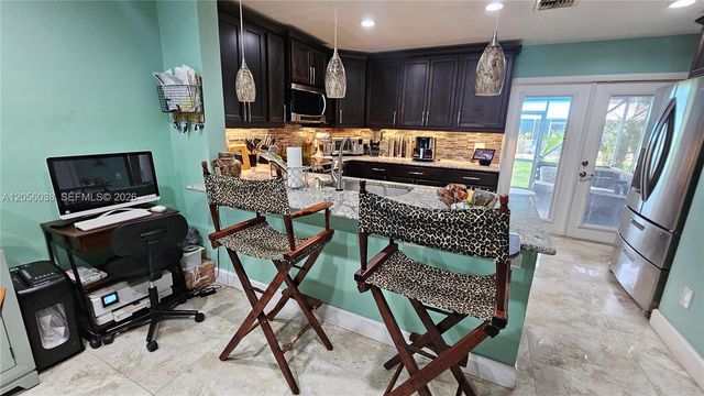 7252 Woodmont Avenue, Tamarac, FL 33321