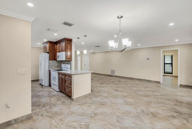 6210 Olivewood Circle, Greenacres, FL 33463