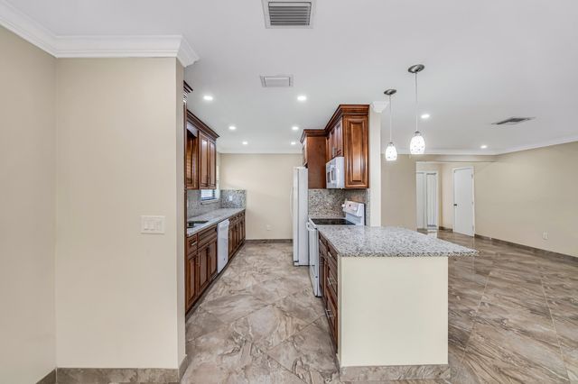 6210 Olivewood Circle, Greenacres, FL 33463