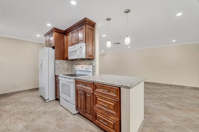 6210 Olivewood Circle, Greenacres, FL 33463