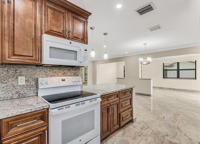 6210 Olivewood Circle, Greenacres, FL 33463