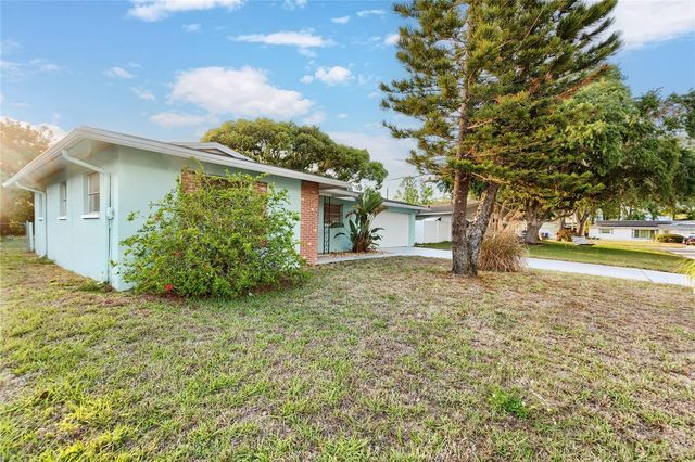 1248 LAZY LAKE ROAD W, Dunedin, FL 34698