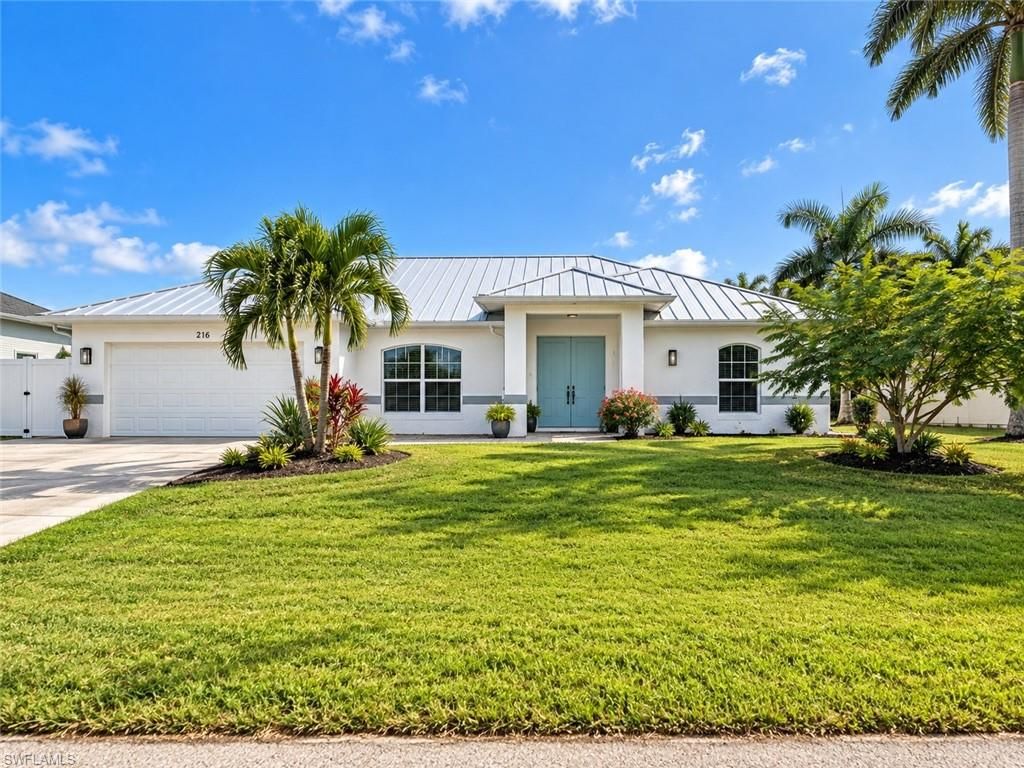 216 NW 31st PL, CAPE CORAL, FL 33993 — photo 2