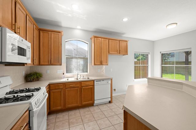11911 N Brenton Knoll Court, Tomball, TX 77375