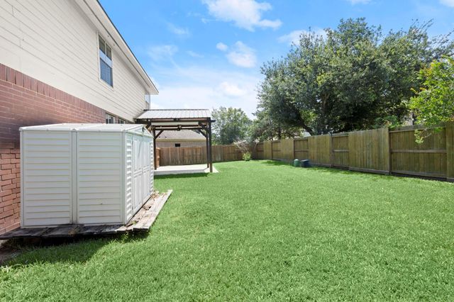 11911 N Brenton Knoll Court, Tomball, TX 77375