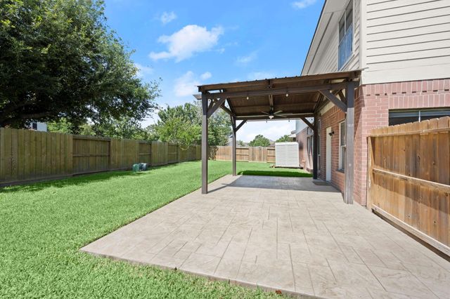 11911 N Brenton Knoll Court, Tomball, TX 77375