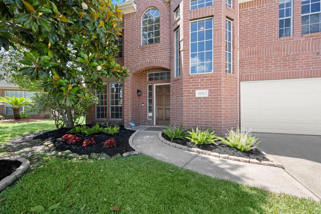 11911 N Brenton Knoll Court, Tomball, TX 77375