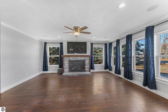 7423 Scotchwood Lane, Grawn, MI 49637