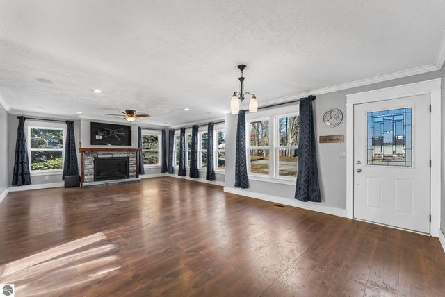 7423 Scotchwood Lane, Grawn, MI 49637