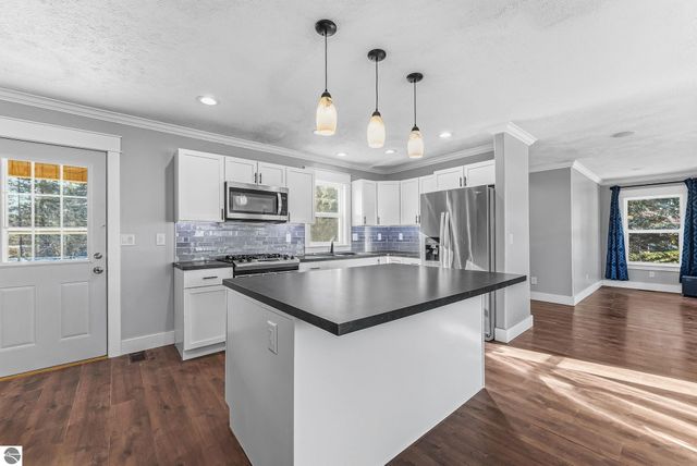 7423 Scotchwood Lane, Grawn, MI 49637