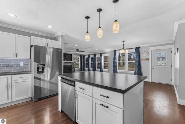 7423 Scotchwood Lane, Grawn, MI 49637