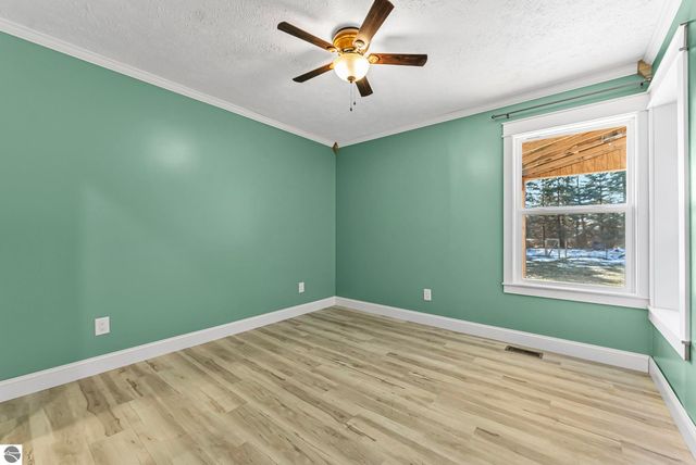 7423 Scotchwood Lane, Grawn, MI 49637