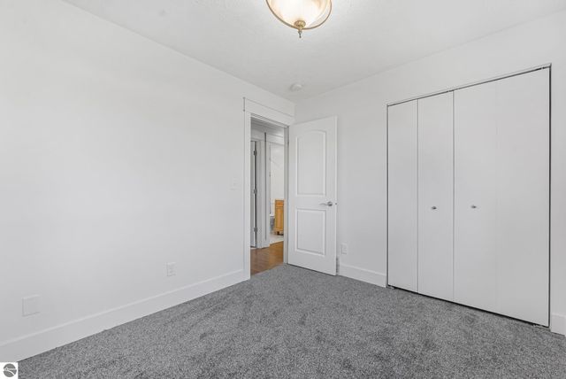 7423 Scotchwood Lane, Grawn, MI 49637