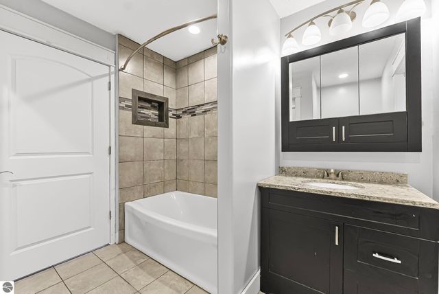 7423 Scotchwood Lane, Grawn, MI 49637