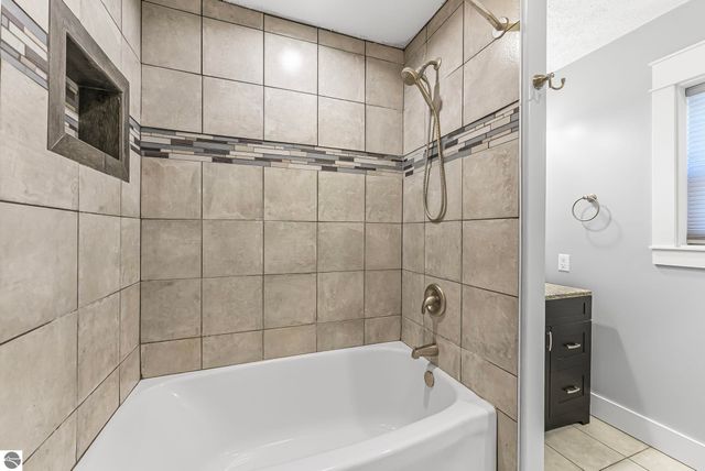 7423 Scotchwood Lane, Grawn, MI 49637