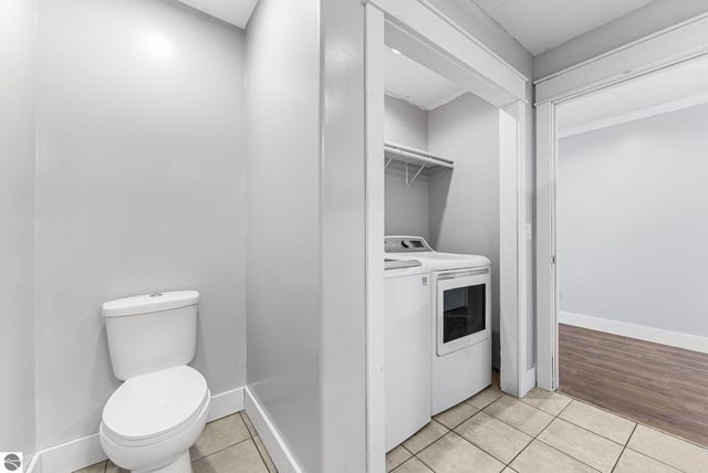 7423 Scotchwood Lane, Grawn, MI 49637