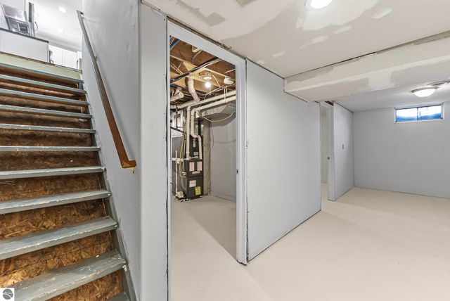 7423 Scotchwood Lane, Grawn, MI 49637