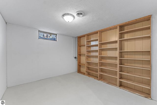 7423 Scotchwood Lane, Grawn, MI 49637