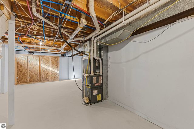 7423 Scotchwood Lane, Grawn, MI 49637