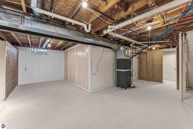 7423 Scotchwood Lane, Grawn, MI 49637