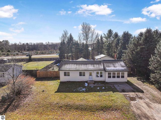 7423 Scotchwood Lane, Grawn, MI 49637