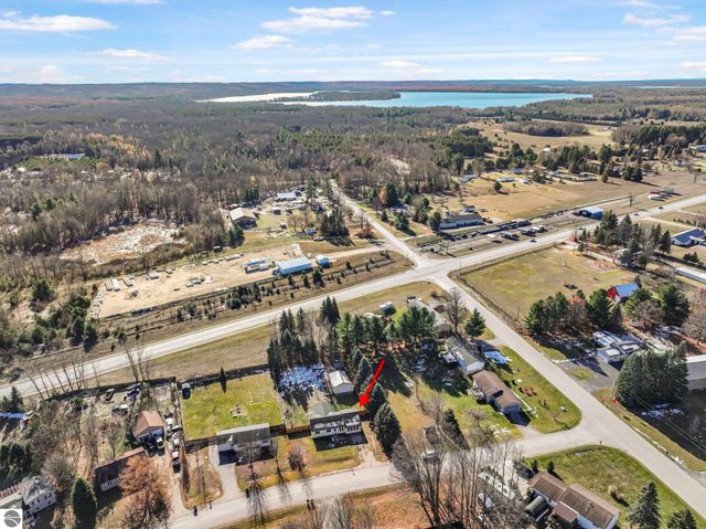 7423 Scotchwood Lane, Grawn, MI 49637