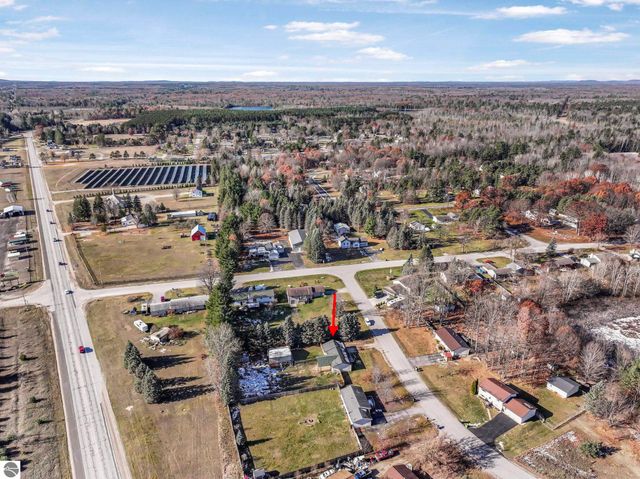 7423 Scotchwood Lane, Grawn, MI 49637