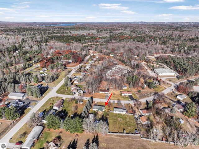 7423 Scotchwood Lane, Grawn, MI 49637