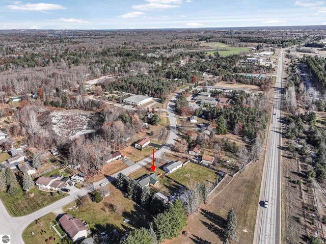 7423 Scotchwood Lane, Grawn, MI 49637