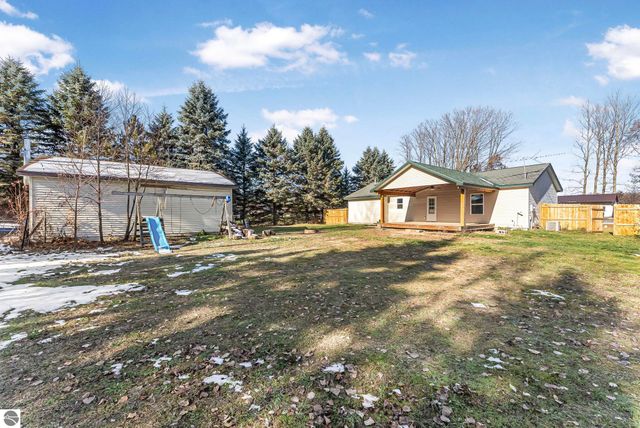 7423 Scotchwood Lane, Grawn, MI 49637