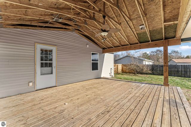 7423 Scotchwood Lane, Grawn, MI 49637