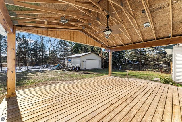 7423 Scotchwood Lane, Grawn, MI 49637