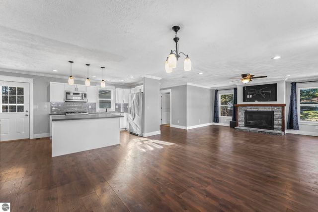 7423 Scotchwood Lane, Grawn, MI 49637