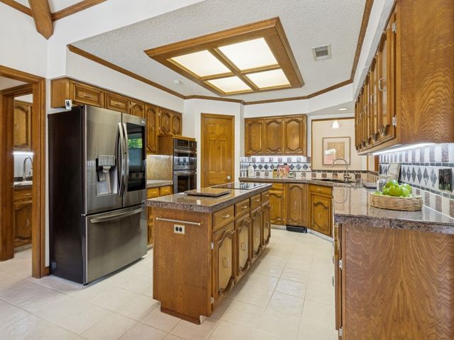9502 Moss Haven Drive, Dallas, TX 75231