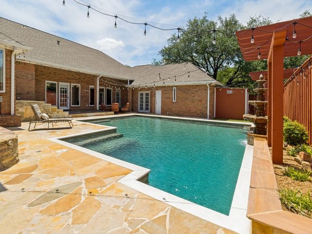 9502 Moss Haven Drive, Dallas, TX 75231