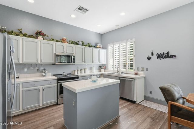 9617 E CHAMPAGNE Drive, Sun Lakes, AZ 85248