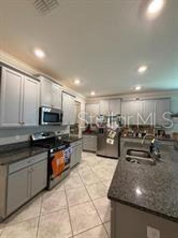 25118 LAMBRUSCO LOOP, Lutz, FL 33559