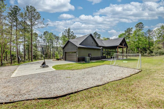 10433 Wagon Pass Trail, Willis, TX 77378