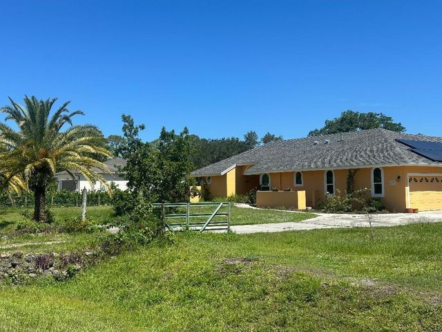 15185 Tangelo Boulevard, West Palm Beach, FL 33412