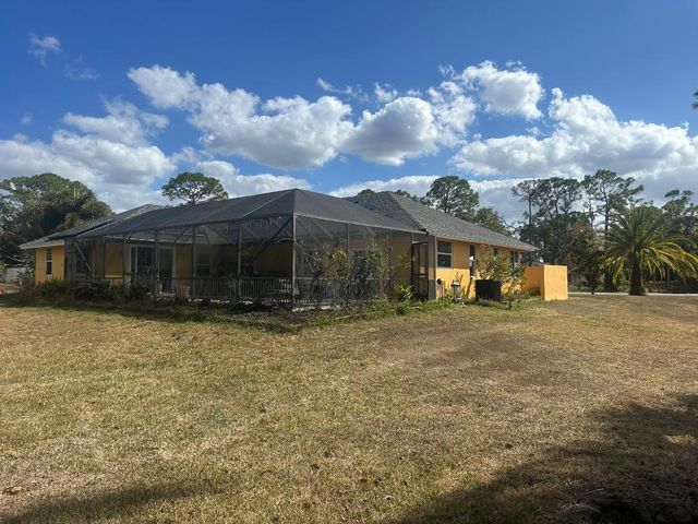 15185 Tangelo Boulevard, West Palm Beach, FL 33412