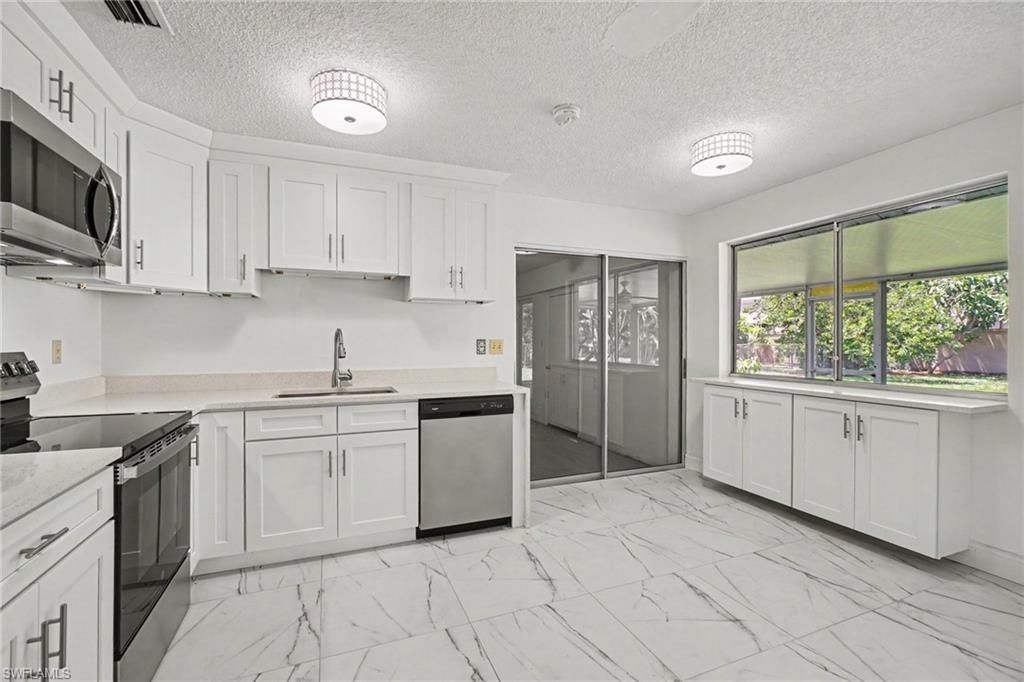 638 NE 15th CT, CAPE CORAL, FL 33909 — exterior