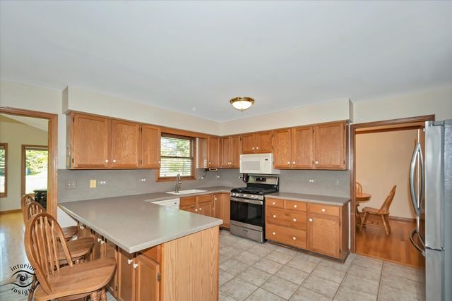 11515 Ellwood Greens Road, Genoa, IL 60135