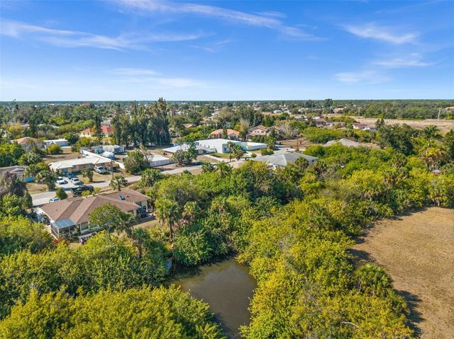 12306 HARLAND AVENUE, North Port, FL 34287