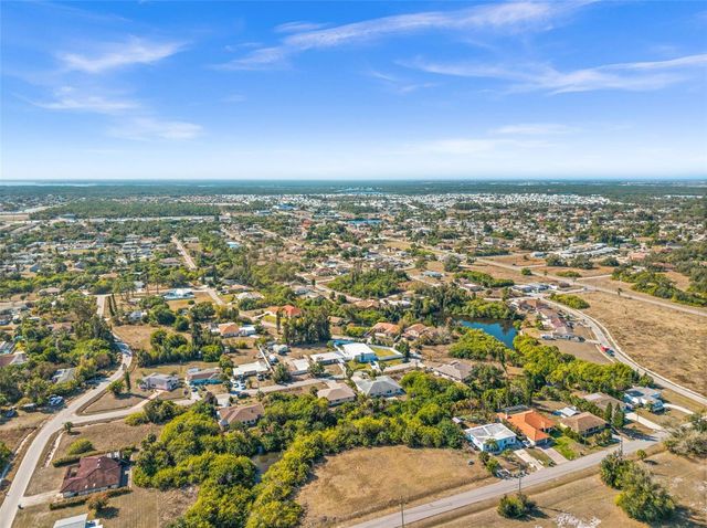 12306 HARLAND AVENUE, North Port, FL 34287